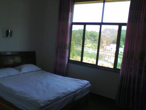 Шанграо: Wuyuan Lvxing Homestay