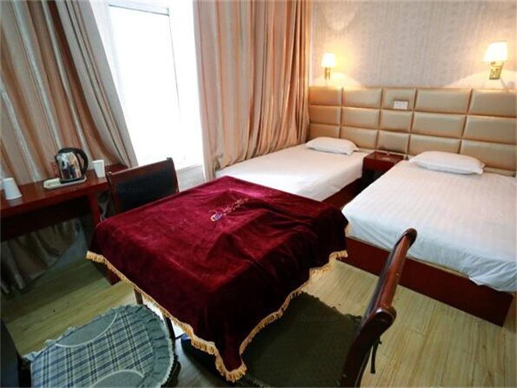 Суцянь: Shuyang Hexie Business Inn