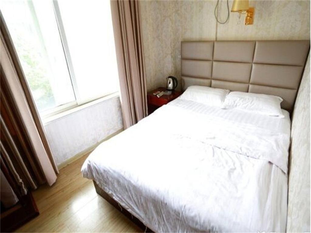 Суцянь: Shuyang Hexie Business Inn