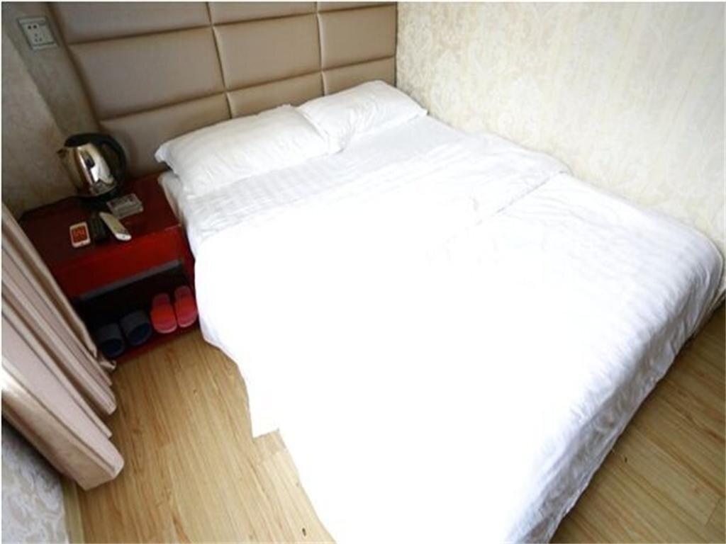 Суцянь: Shuyang Hexie Business Inn
