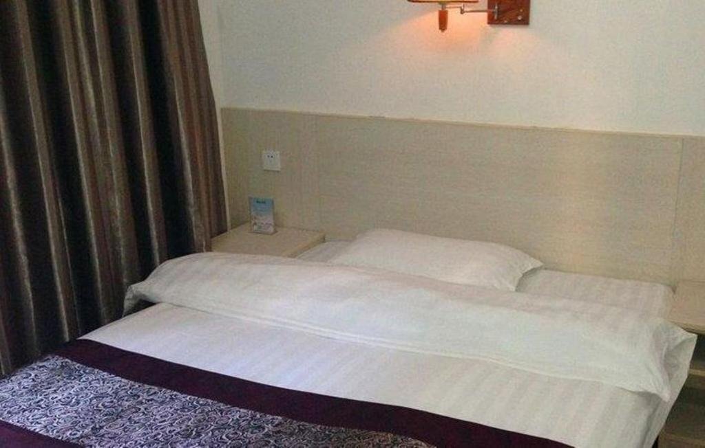 Эньши: Sunshine Business Inn