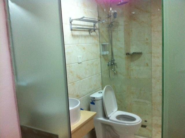 Эньши: Sunshine Business Inn