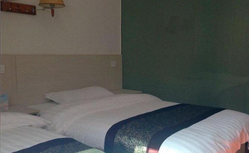 Эньши: Sunshine Business Inn