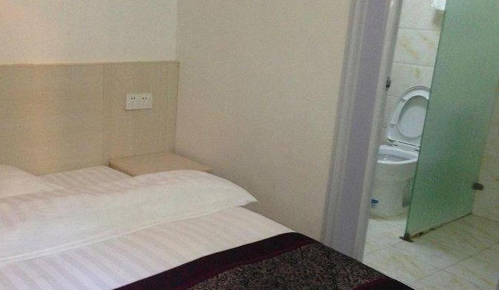 Эньши: Sunshine Business Inn