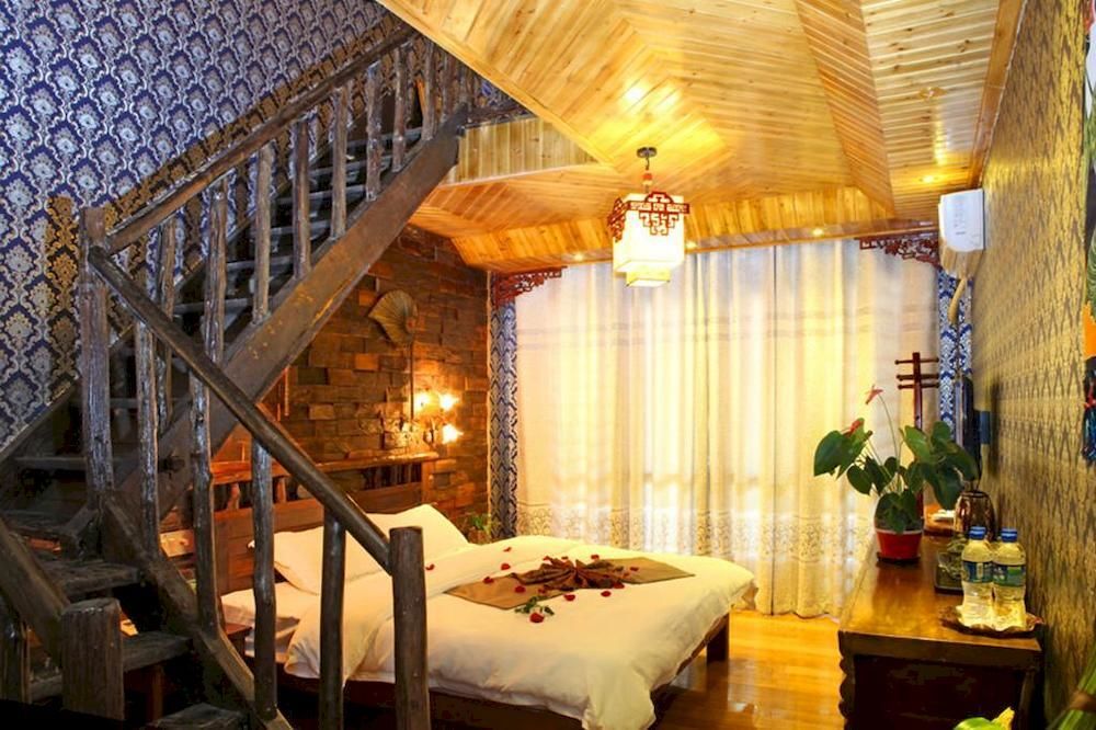Цзинхун: Xishuangbanna Fengweizhu Inn