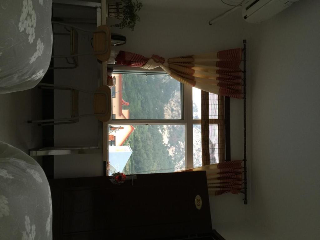 Циндао: Qingdao That Way Inn