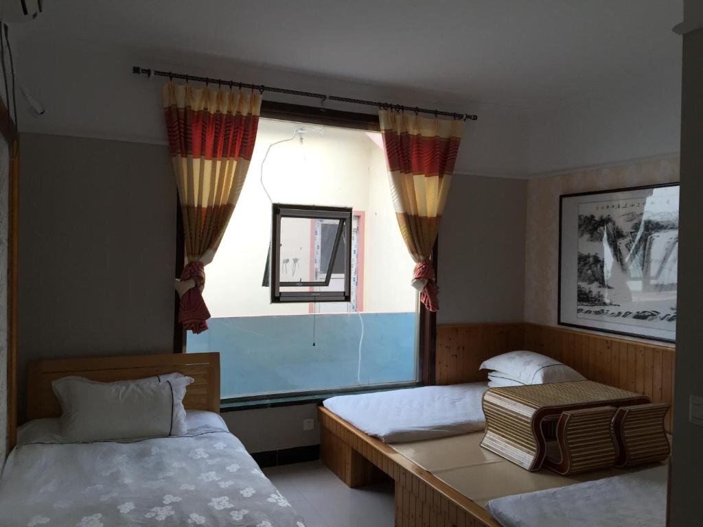 Циндао: Qingdao That Way Inn