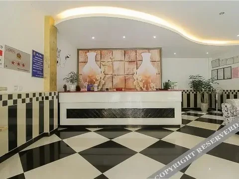 Цюйцзин: Xinhesu Business Hotel (Qujing Railway Station)