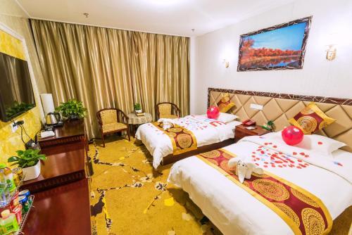 Цзюцюань: Yangguan Hengye Business Hotel