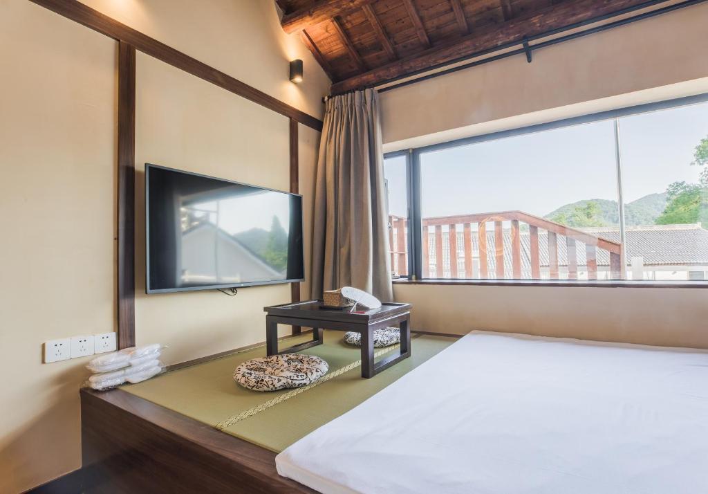 Ханчжоу: Van Wind Inn