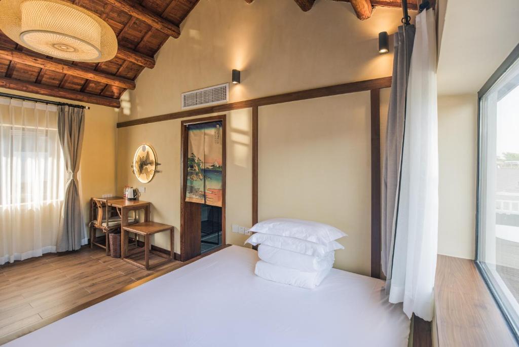 Ханчжоу: Van Wind Inn