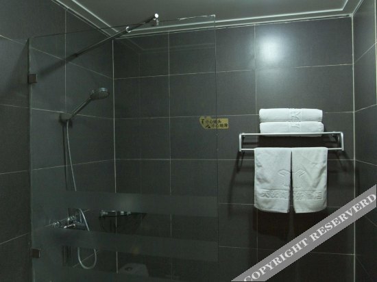 Таншань: Riyuexing Business Hotel