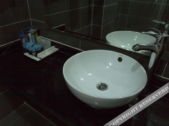 Таншань: Riyuexing Business Hotel
