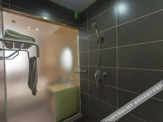 Таншань: Riyuexing Business Hotel