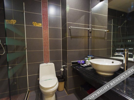 Таншань: Riyuexing Business Hotel
