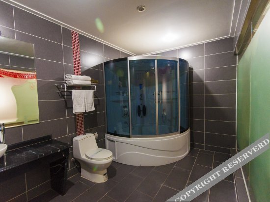 Таншань: Riyuexing Business Hotel