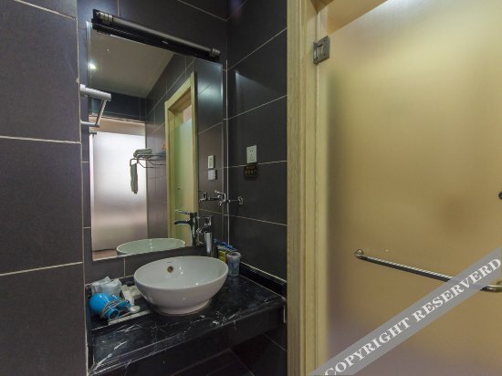 Таншань: Riyuexing Business Hotel