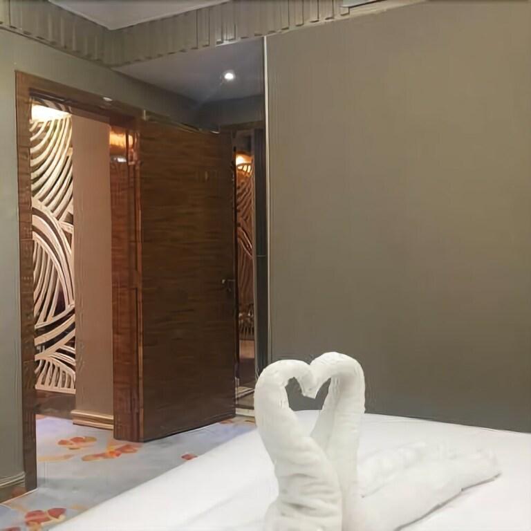 Цюйцзин: 曲靖翠峰大酒店