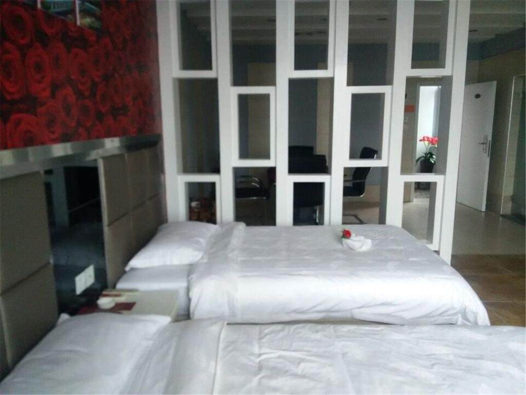 Ичан: Xinshidai Business Hotel