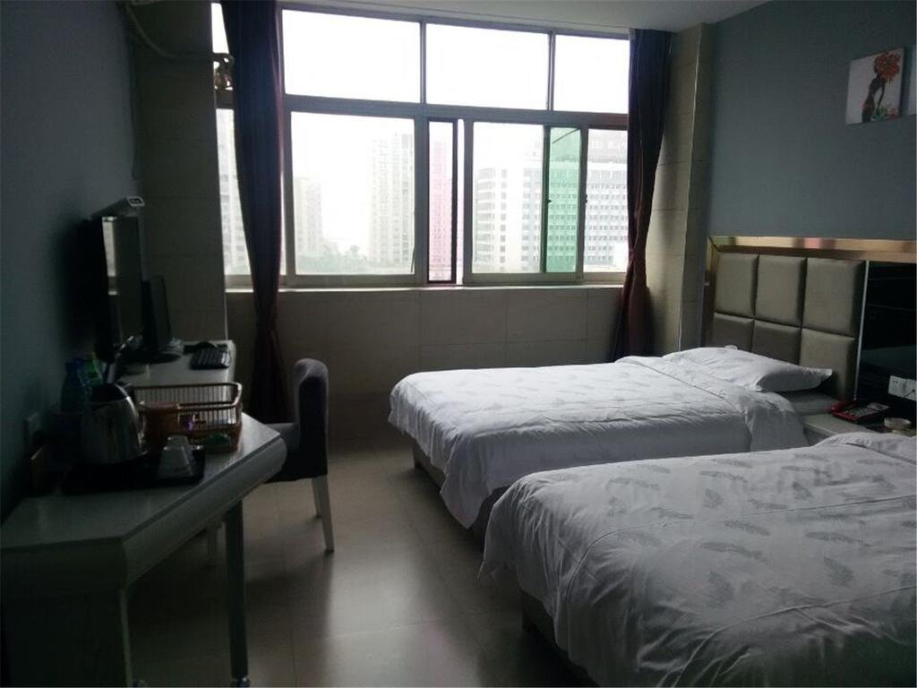 Ичан: Xinshidai Business Hotel