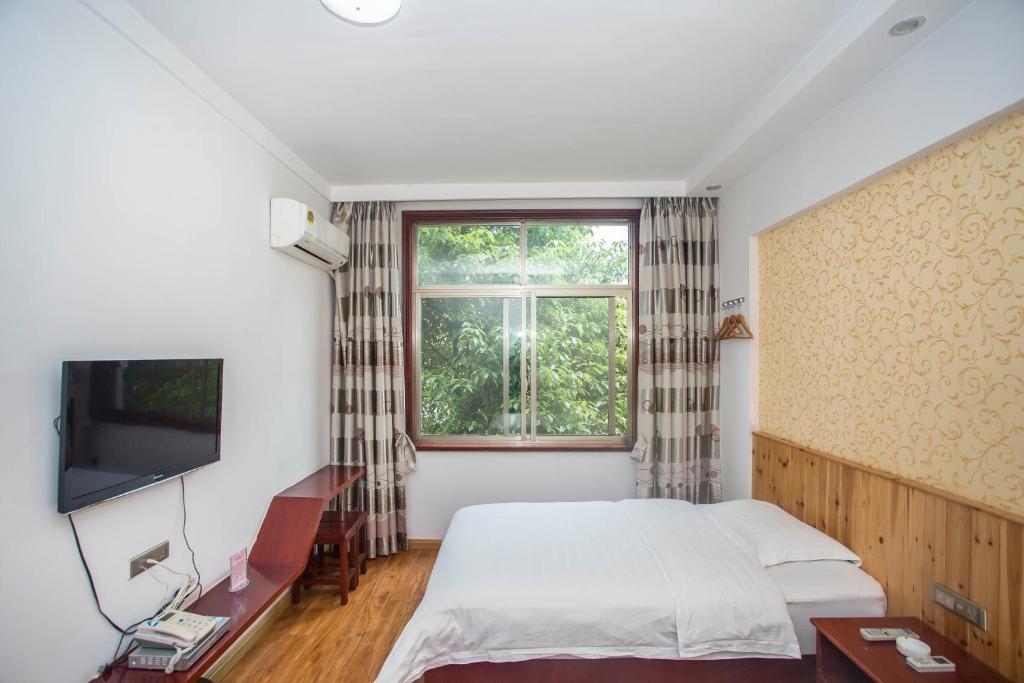 Zhangjiajie Yijiaqin Hotel — фото 2