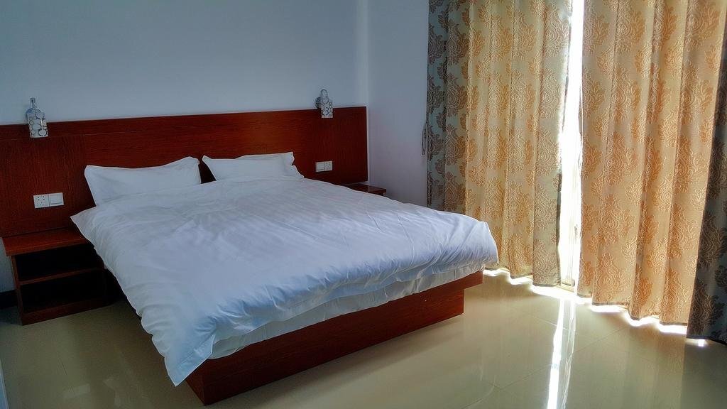 Бэйхай: Weizhou Island Wan Jia Deng Huo Inn