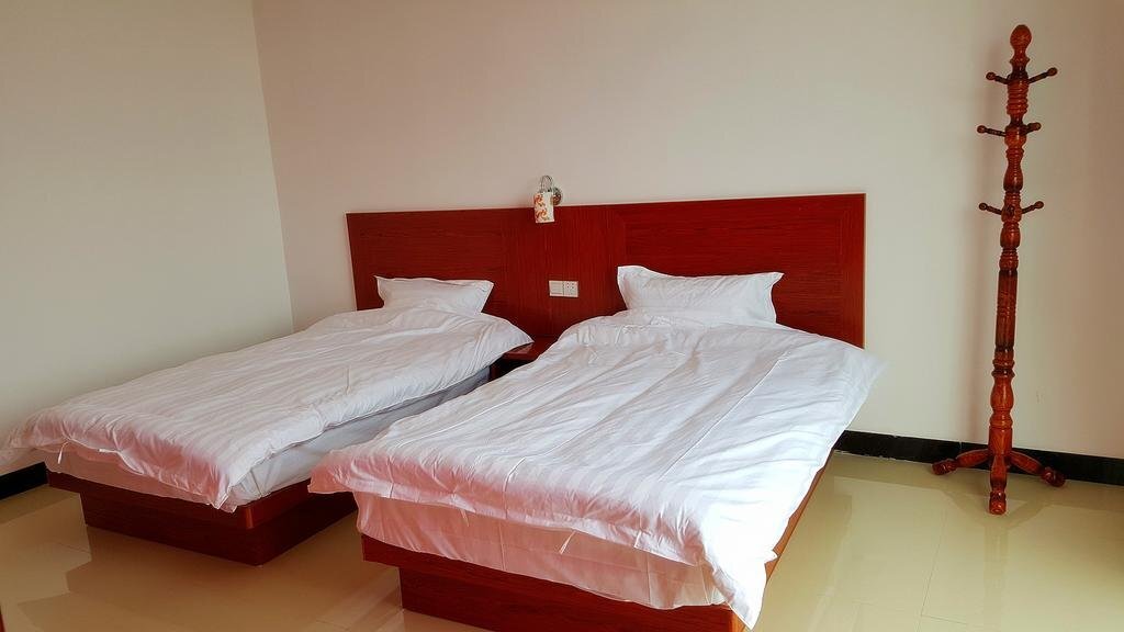 Бэйхай: Weizhou Island Wan Jia Deng Huo Inn