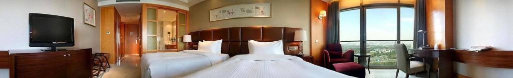 Уси: Wuxi Juna Hubin Hotel