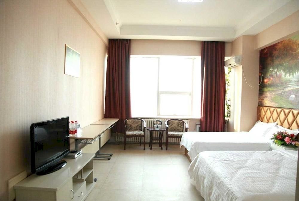 Далянь: Champs Elysees Jinfu Apartment