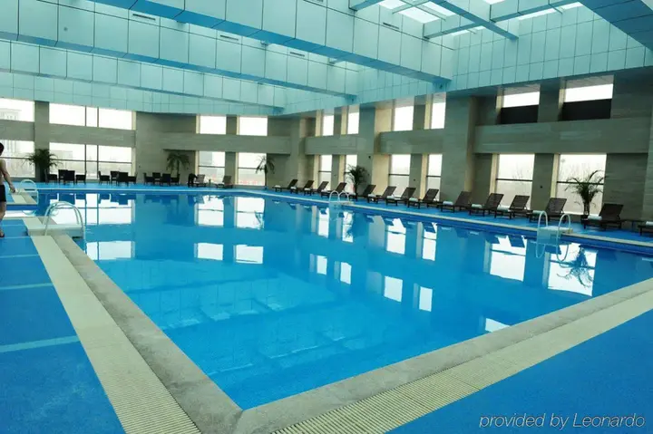 Цзинин: Sun Plaza International Hotel