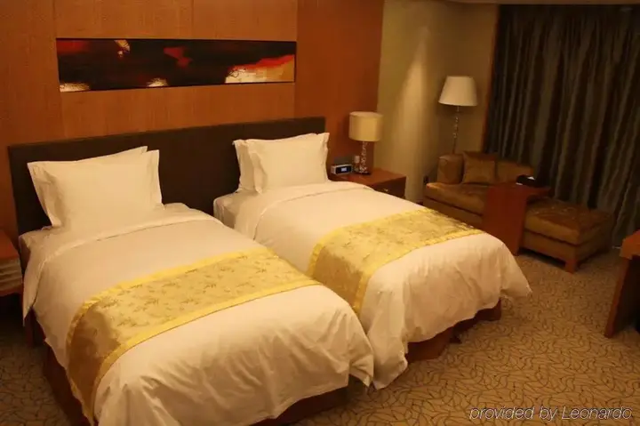 Цзинин: Sun Plaza International Hotel