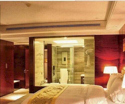 Цзинин: Sun Plaza International Hotel