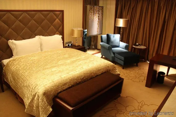 Цзинин: Sun Plaza International Hotel