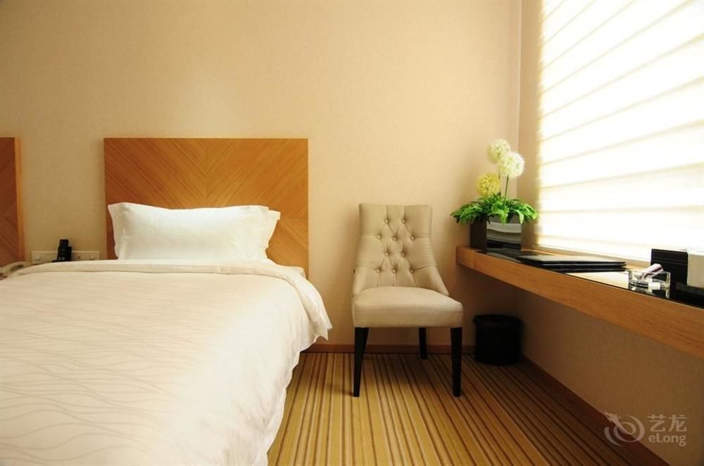 Ухань: Wuhan Yuntai 6 Plus 1 Hotel