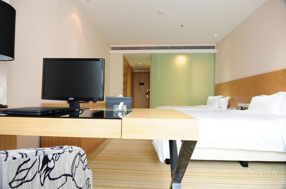 Ухань: Wuhan Yuntai 6 Plus 1 Hotel
