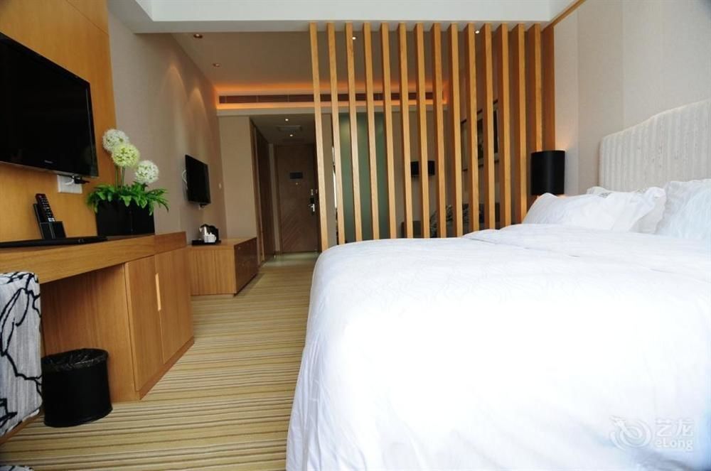 Ухань: Wuhan Yuntai 6 Plus 1 Hotel