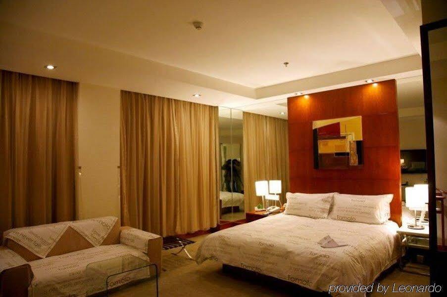 Ухань: Yangtze River TOMOLO Hotel (Jianghan Road Branch)