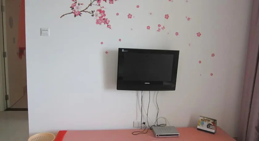 Санья: Sanya Le Zai Lv Tu Apartment