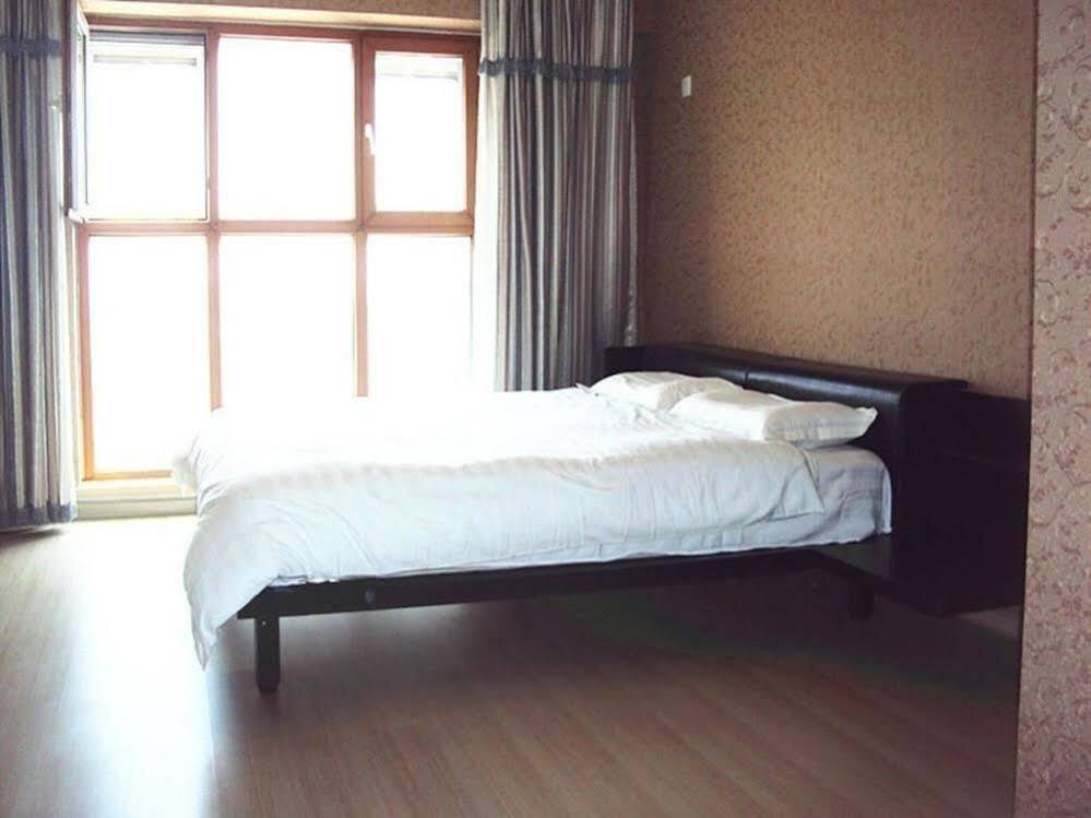 Харбин: Harbin Mykal Xinwang Apartment
