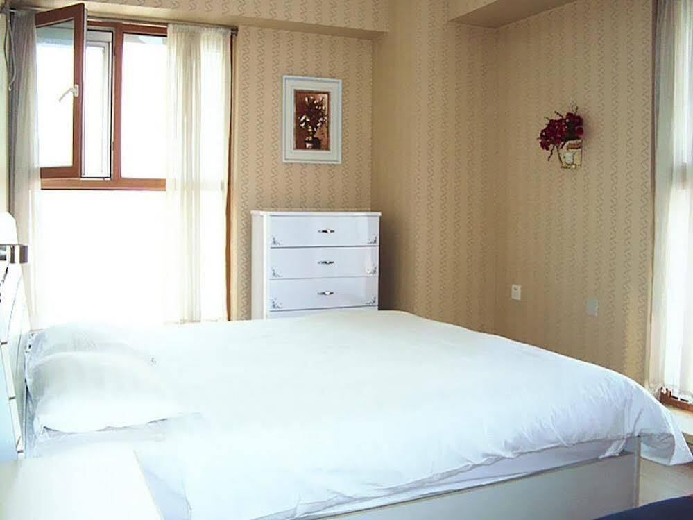 Харбин: Harbin Mykal Xinwang Apartment