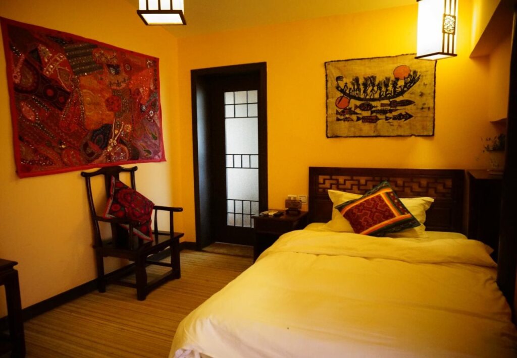 Лицзян: Lijiang Wangjia Courtyard Inn