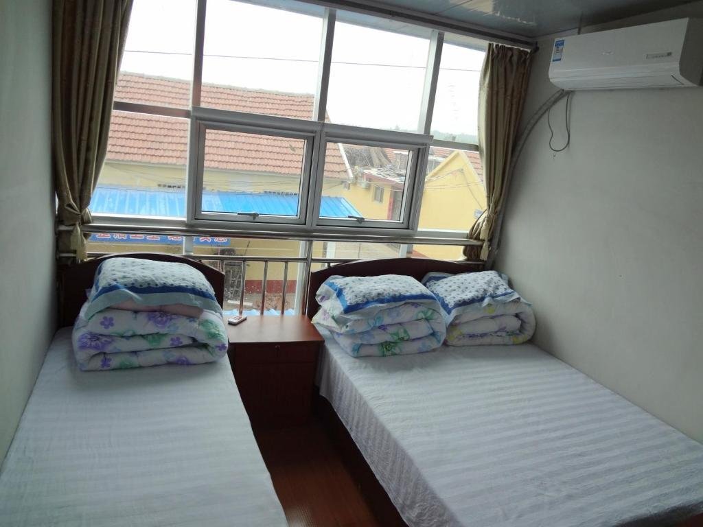Жичжао: Rizhao Hongqiang Yujia Hotel