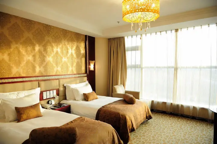 Яньтай: Vienna International Hotel Shandong Yantai FTA Jinshatan Xingyi Square