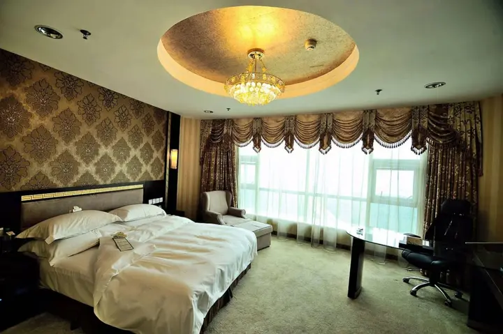 Яньтай: Vienna International Hotel Shandong Yantai FTA Jinshatan Xingyi Square