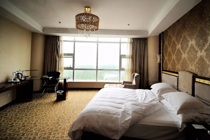 Яньтай: Vienna International Hotel Shandong Yantai FTA Jinshatan Xingyi Square