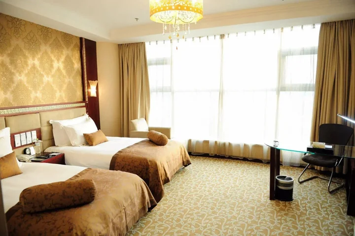 Яньтай: Vienna International Hotel Shandong Yantai FTA Jinshatan Xingyi Square