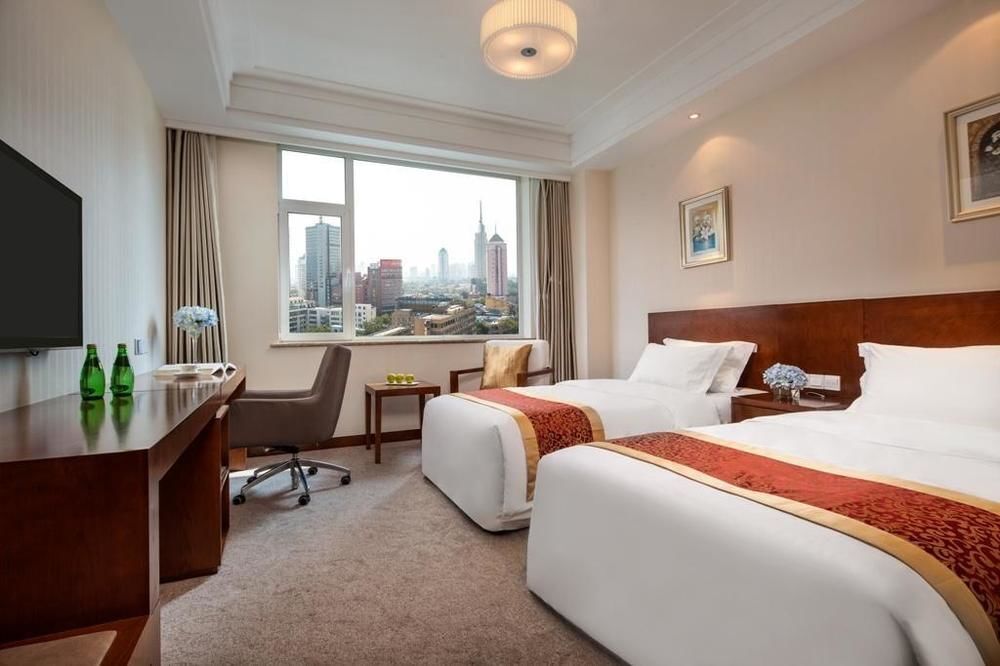 Jinan Luneng Xinyi Hotel — фото 6