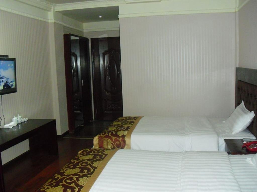 Дажоу: Wanhao Business Hotel