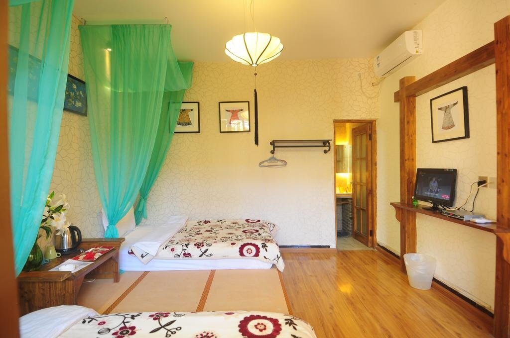 Лицзян: Warm Flowers Guesthouse Shiyizhong Branch