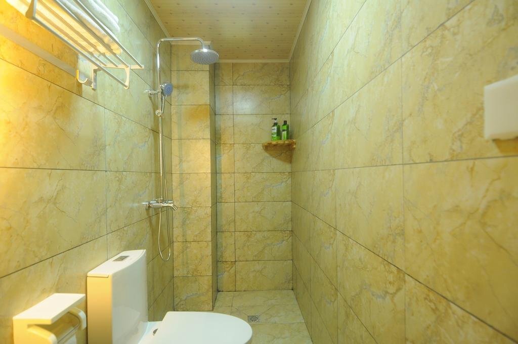 Лицзян: Warm Flowers Guesthouse Shiyizhong Branch
